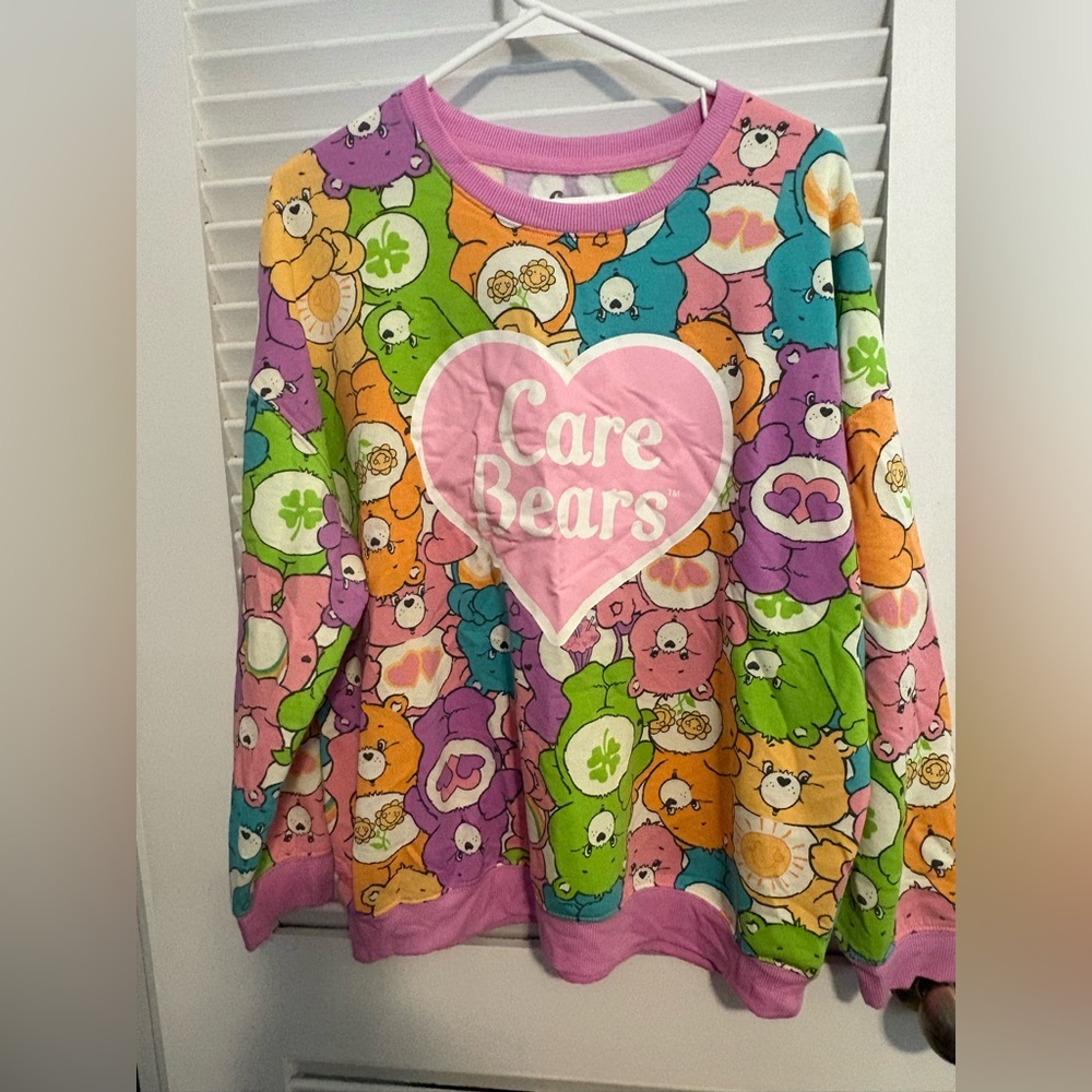Women’s Care Bears eclectic sweatshirt. Size L, never worn
